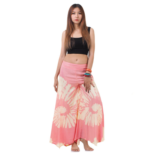 Front view of a female model wearing the Radiant Red Hippie Tie Dye Palazzo Pants, designed with an elastic waist for easy wear.