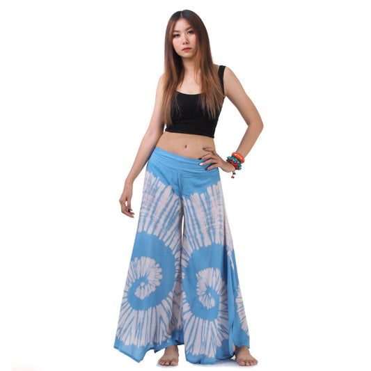 Front view of a female model wearing the Royal Blue Hippie Tie Dye Palazzo Pants with a flexible gathered waistband.