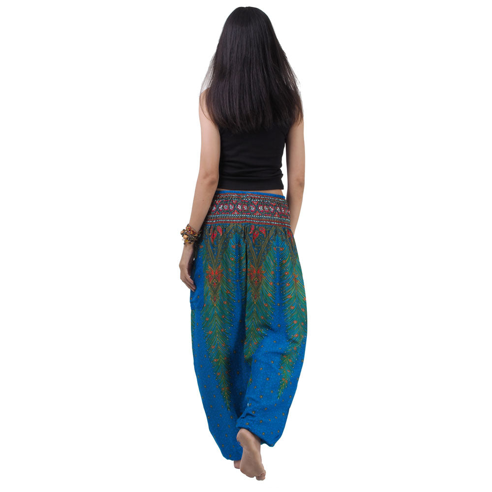 Back view of blue Thai harem yoga pants with peacock print worn with black top