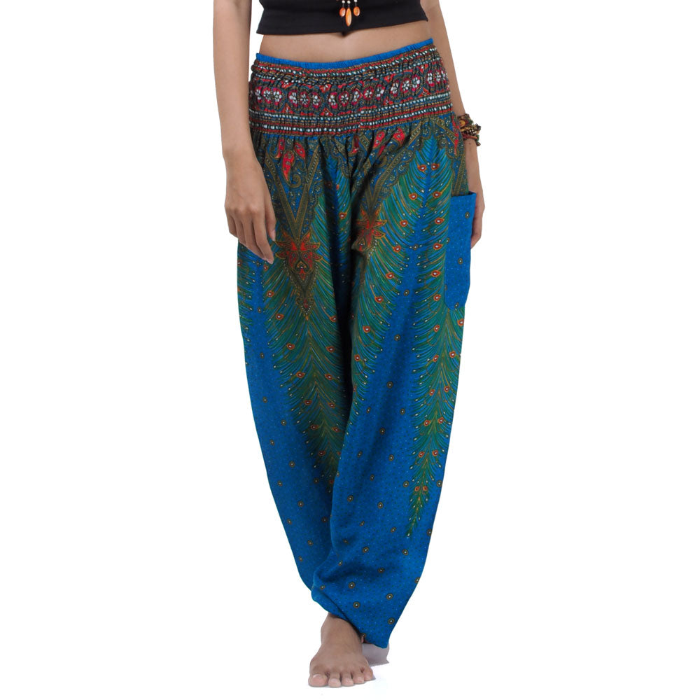 Close-up of blue Thai harem yoga pants with peacock print