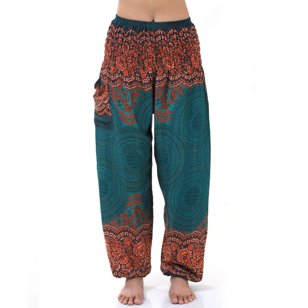 Close-up of turquoise Thai harem yoga pants with mandala print
