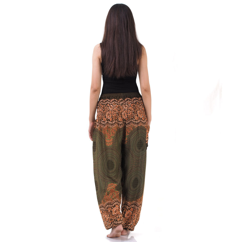 Back view of olive green Thai harem yoga pants with mandala print worn with black top