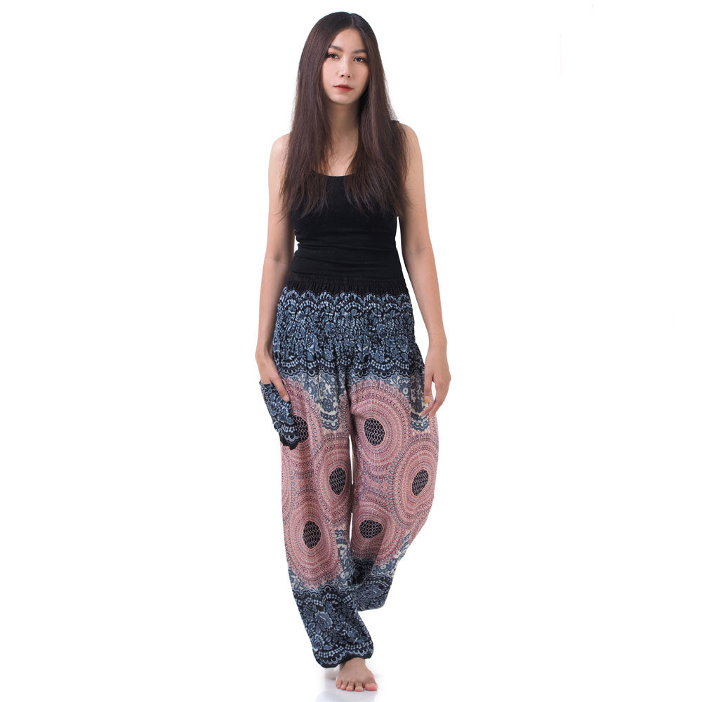 Model wearing mystic gray Thai harem yoga pants with mandala print and black top, front view