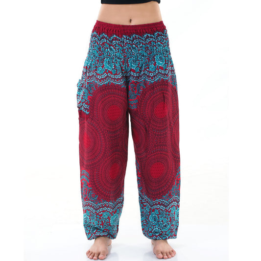 Close-up of red Thai harem yoga pants with mandala print
