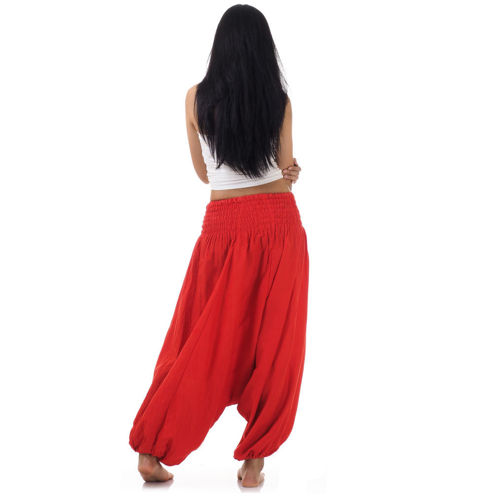 Back view of red thai 2-in-1 jumpsuit harem pants worn with white top
