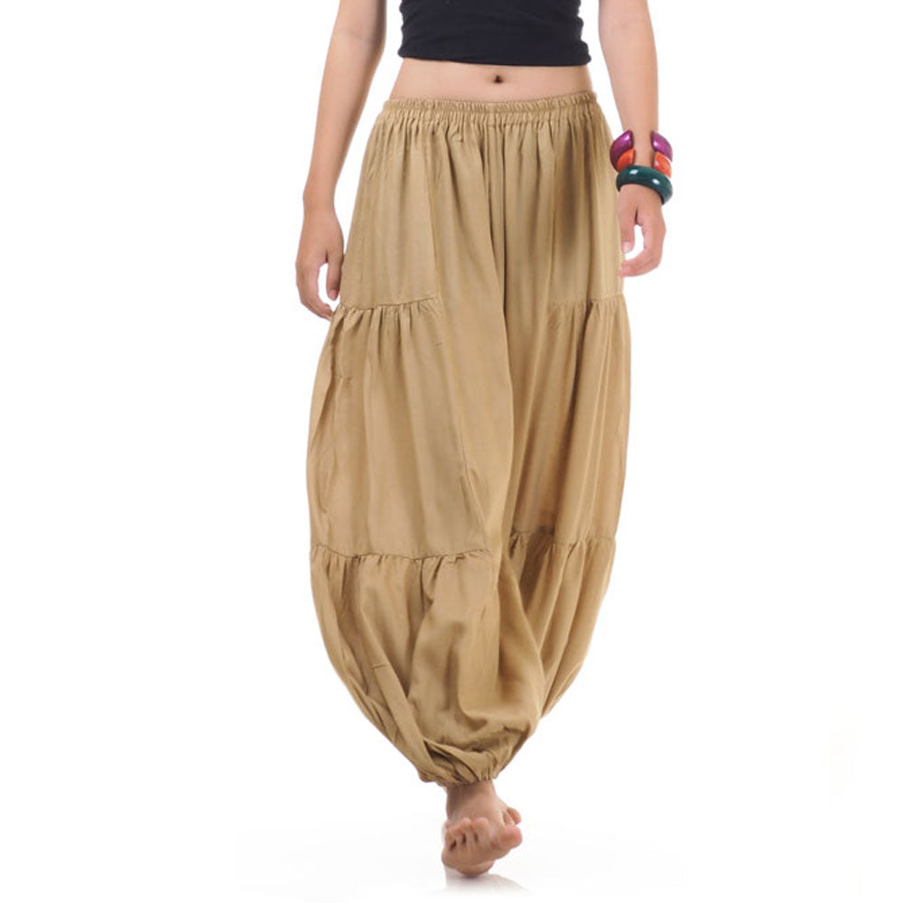 Close-up of a beige women Thai harem yoga pants