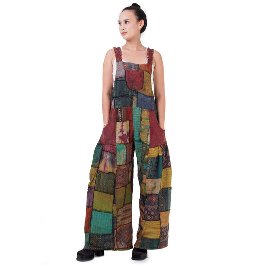 Front view of brown boho patchwork wide-leg overall jumpsuit on a neutral background.