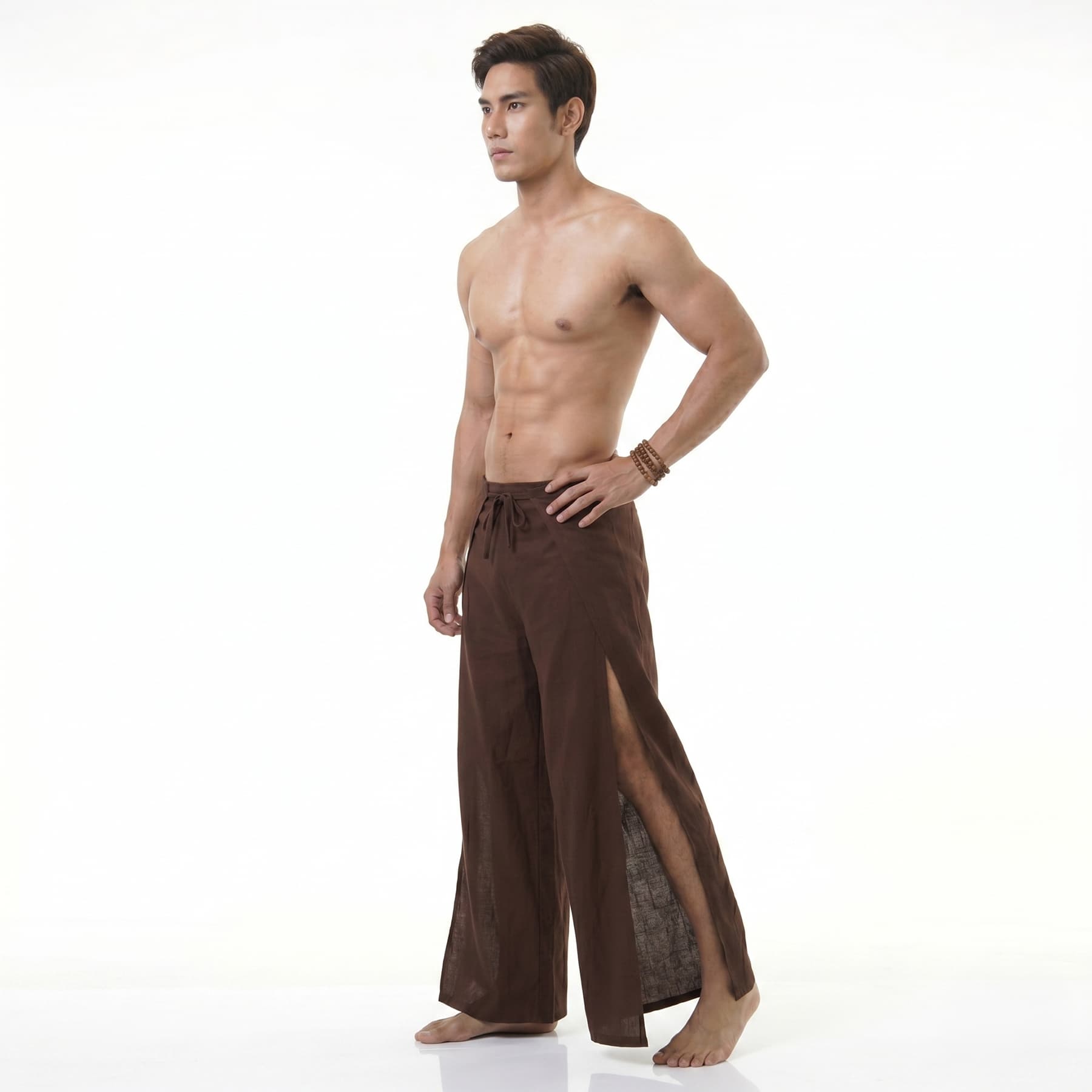 Side view of the sienna brown Men's wrap pants, displaying the traditional wide-leg design.