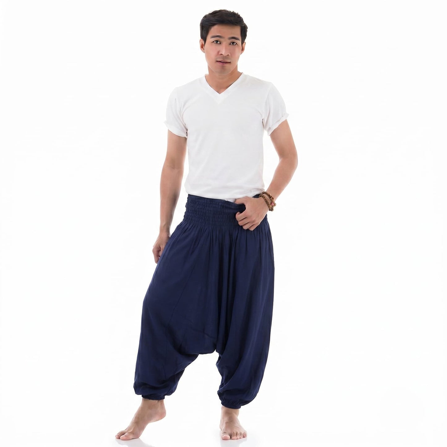 Side profile of the navy blue Men's low crotch pants, showing the comfortable flowy style.