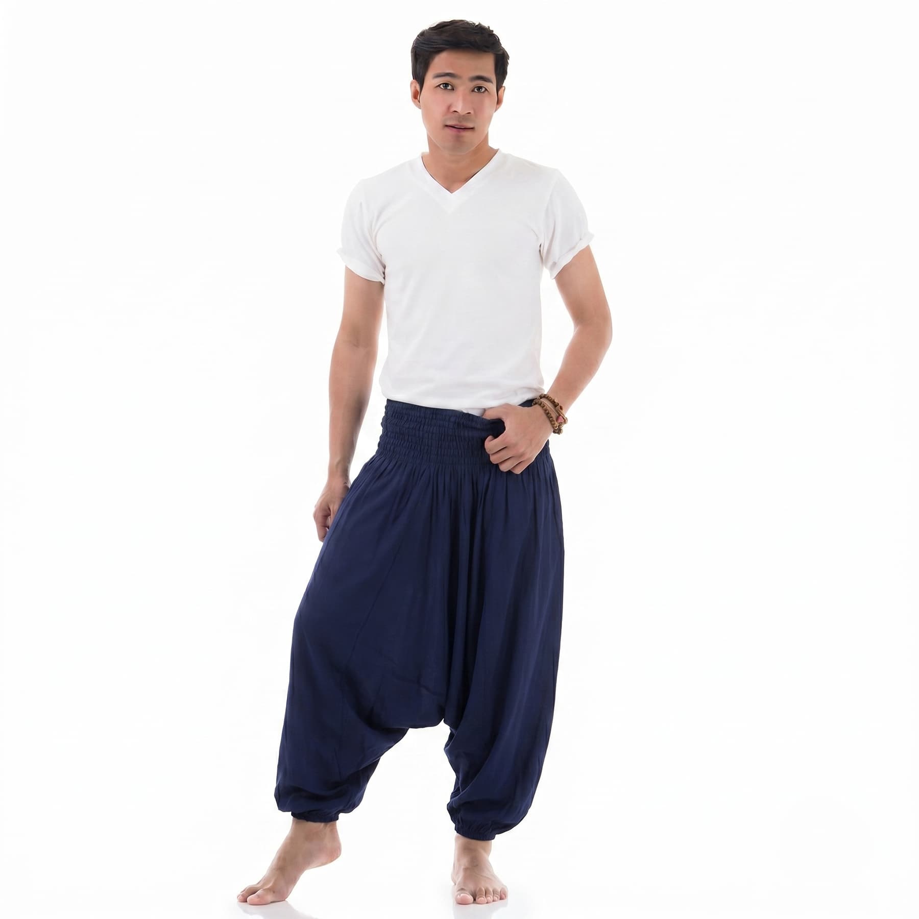 Side profile of the navy blue Men's low crotch pants, showing the comfortable flowy style.