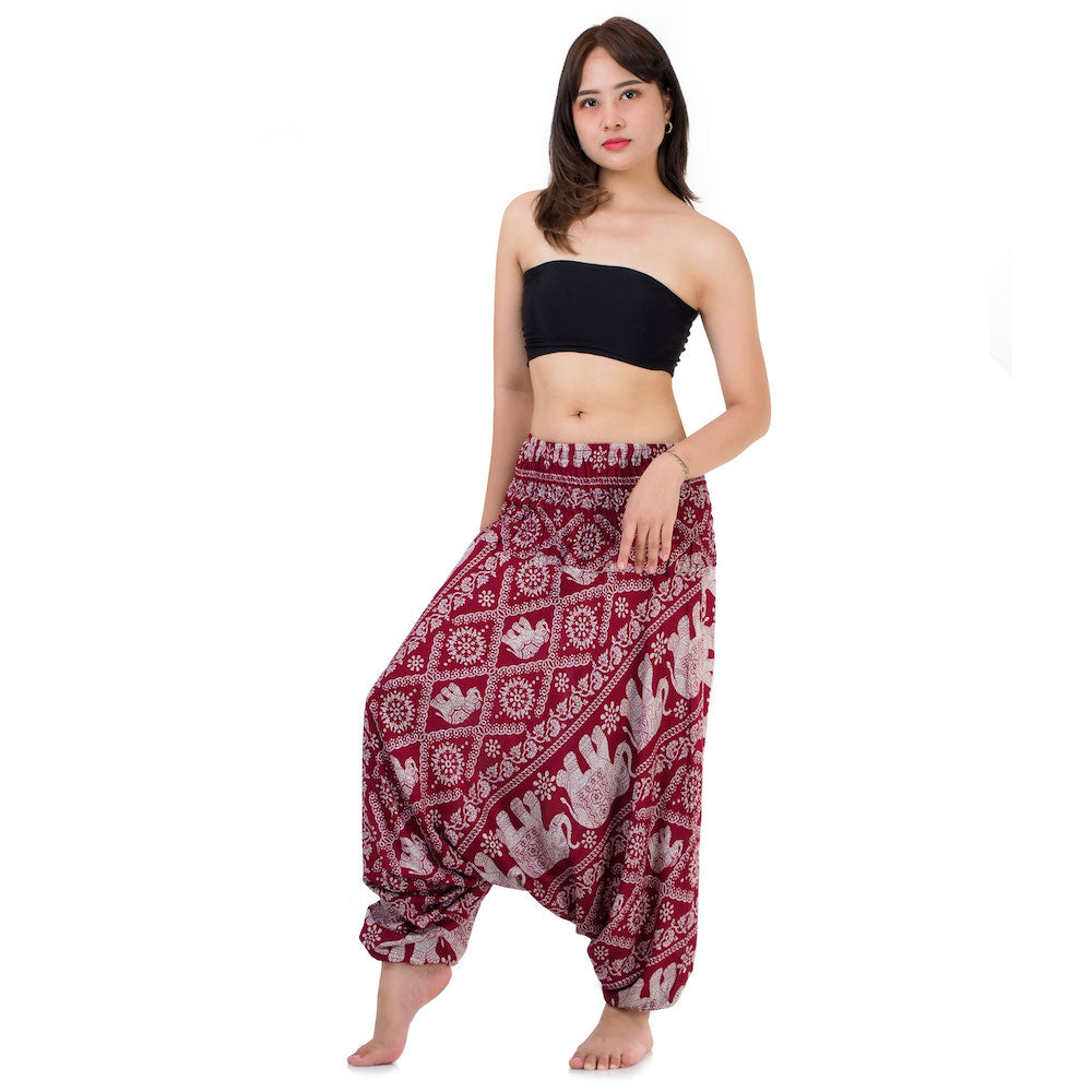 Front view of red handmade elephant jumpsuit pants, fits Small to Large.