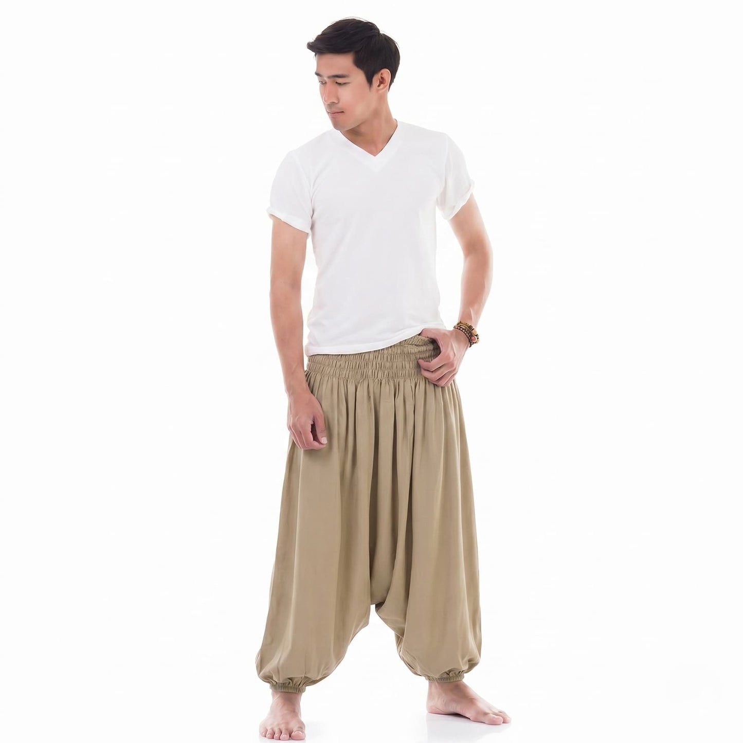 Front view of the beige drop crotch harem pants for men, handcrafted under ethical conditions.