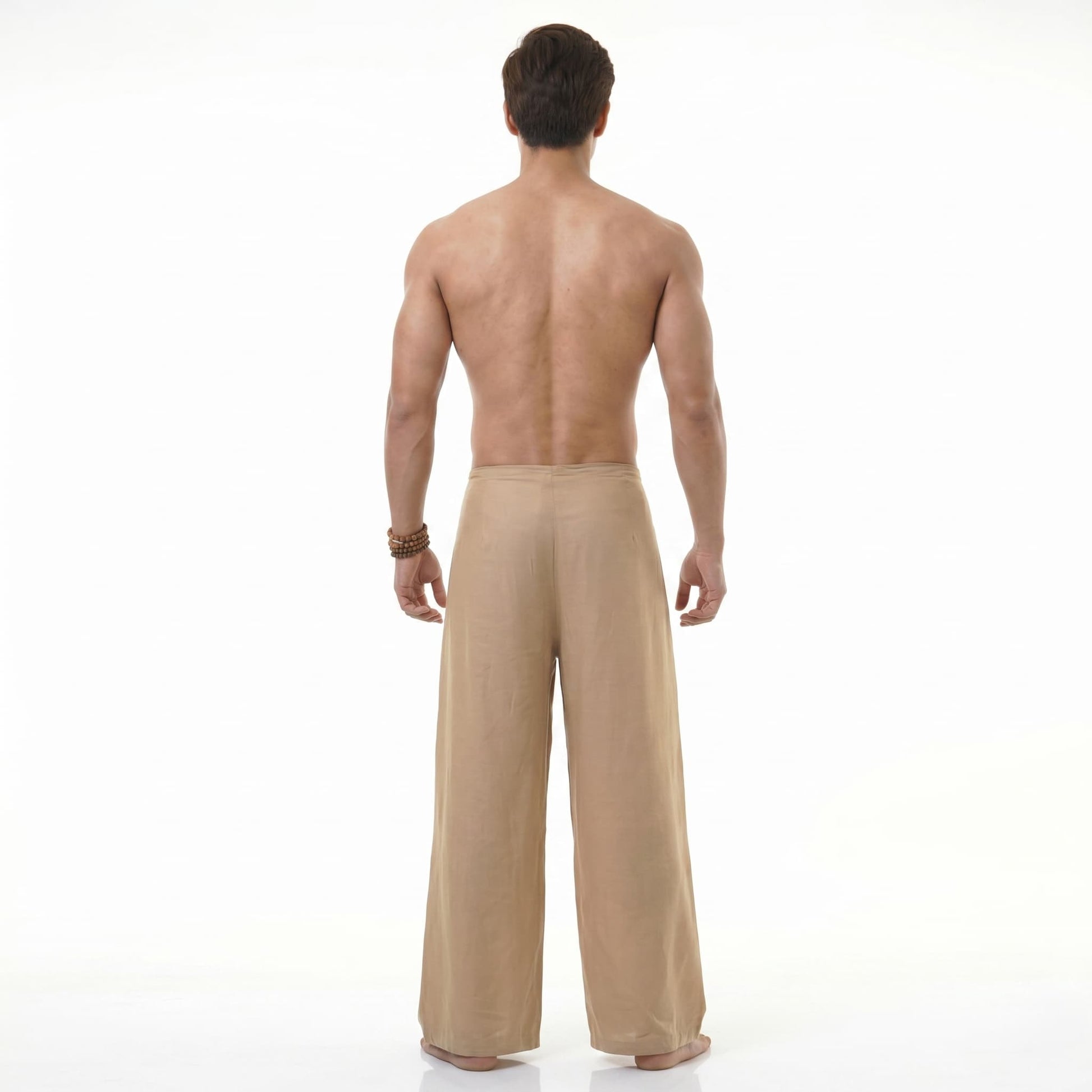 Rear view of the sand-colored Men's Thai wrap pants, showing the clean and simple design.