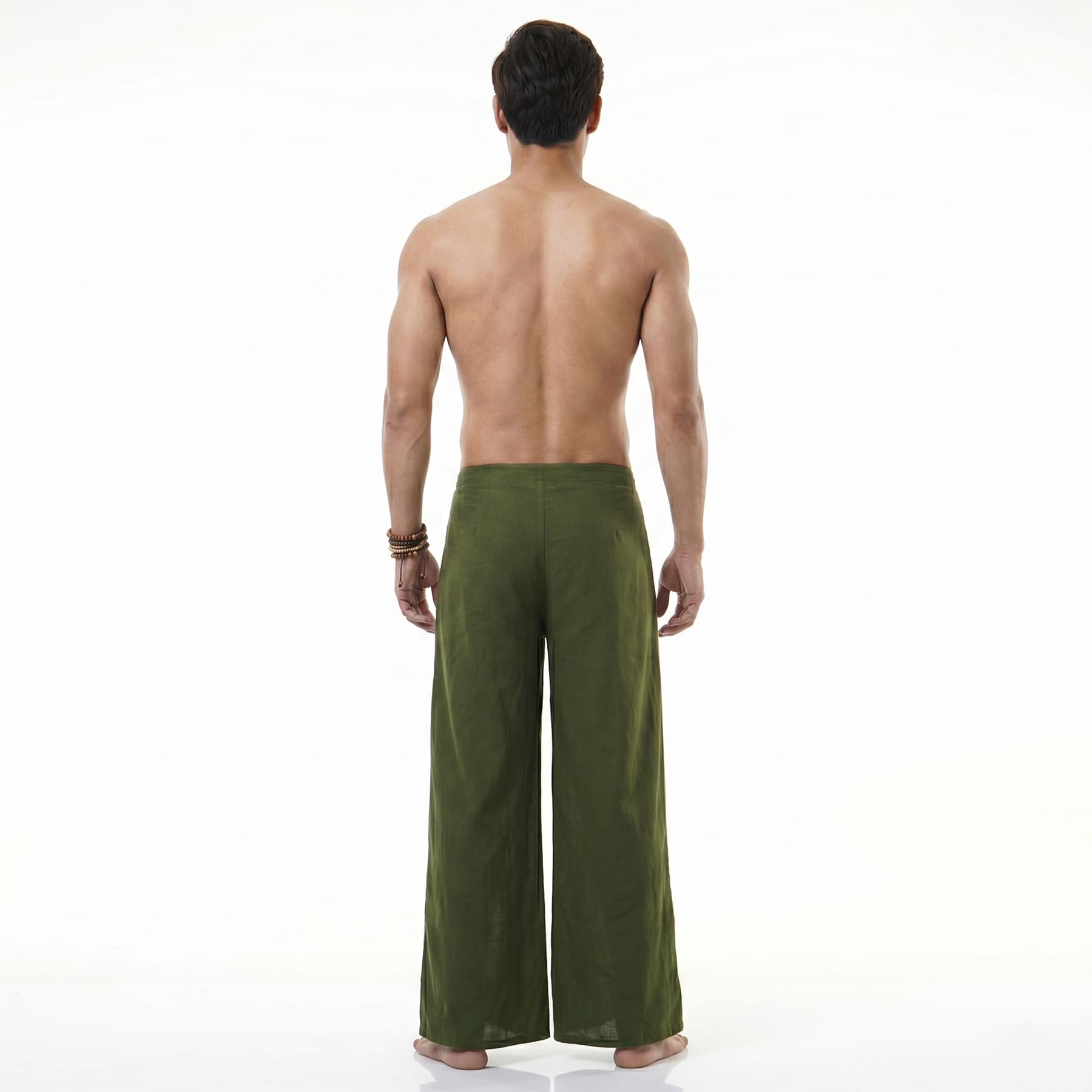 Back view of the emerald green Fisherman pants for men, offering maximum breathability.
