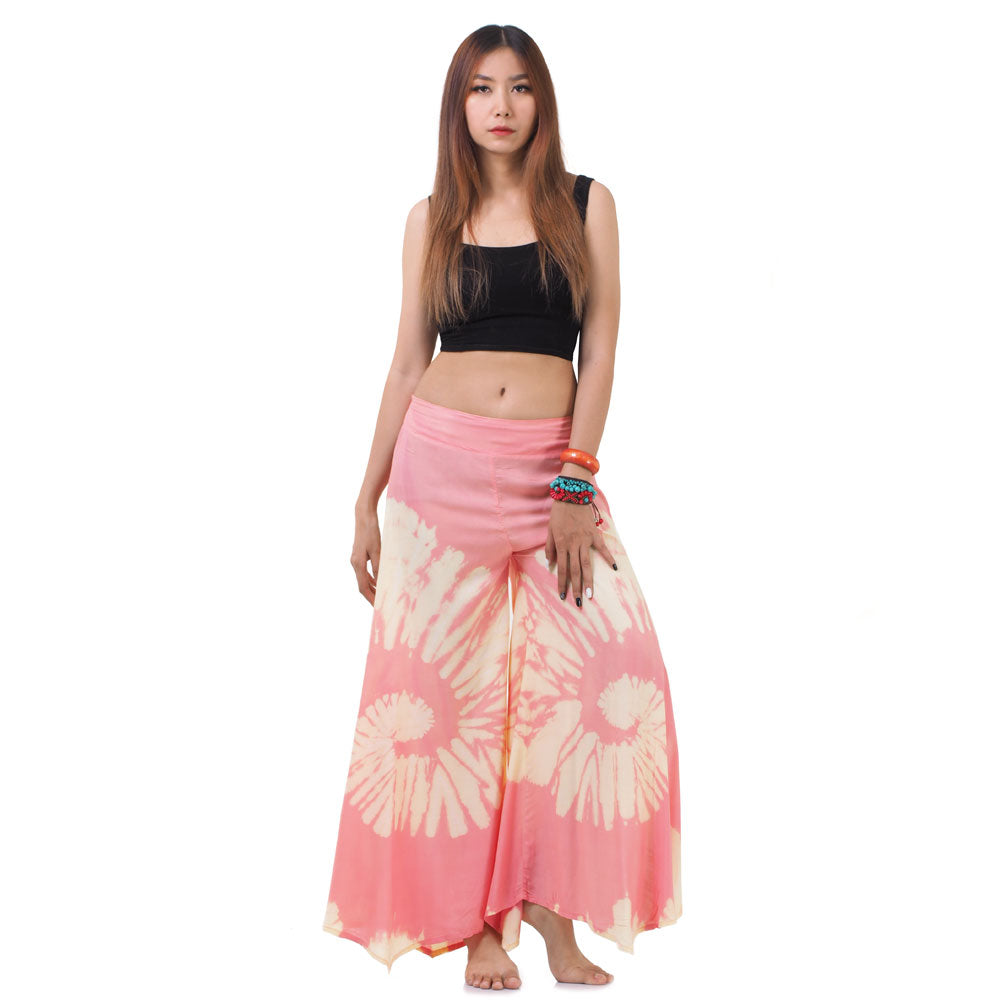 Front view of a female model wearing the Radiant Red Hippie Tie Dye Palazzo Pants, designed with an elastic waist for easy wear.