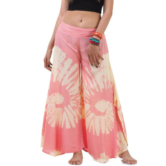 Detailed close-up of the Radiant Red Hippie Tie Dye Palazzo Pants, showing the warm coral-red tie-dye tones and natural texture.