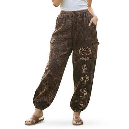 Close-up shot of brown stonewashed lotus harem pants showing natural cotton and cargo pocket detail.