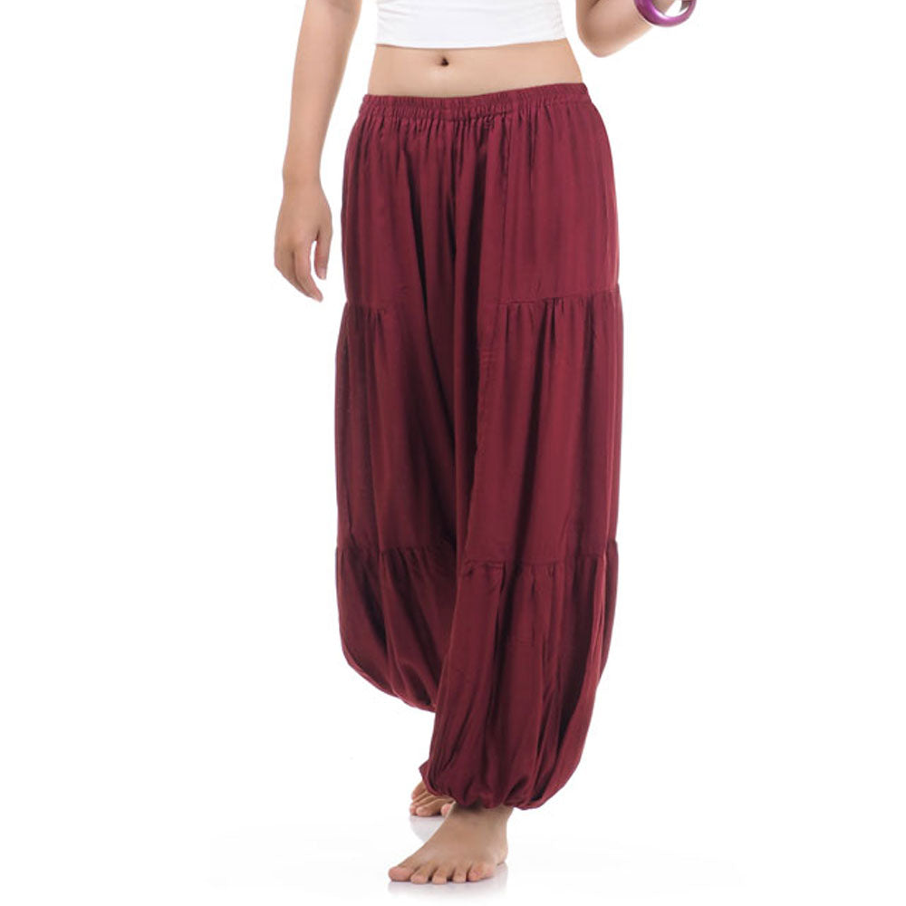 Close-up of a maroon women Thai harem yoga pants