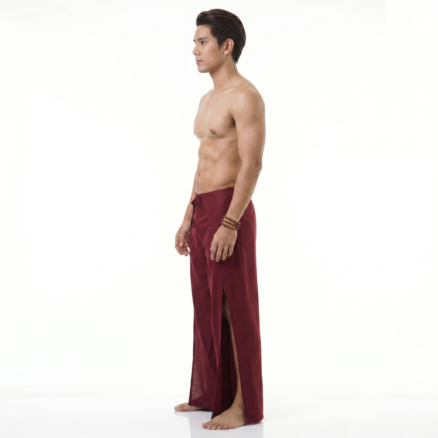 Side view of the maroon wrap pants for men, displaying the authentic folding silhouette.