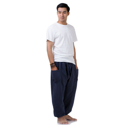Side view of the blue pinstripe pants, showcasing the signature flowy harem style.