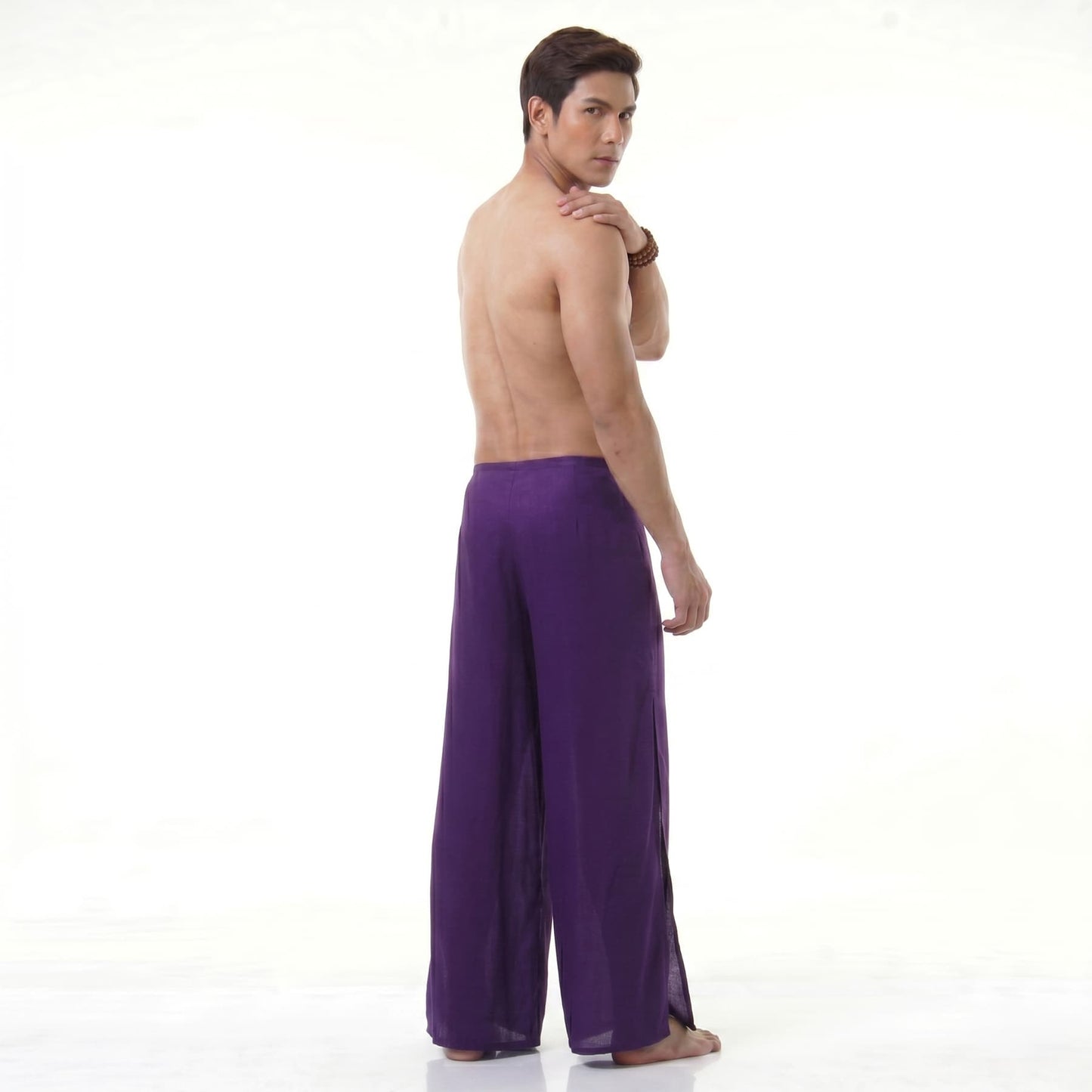 Rear view of the purple Men's Fisherman pants, displaying the airy and relaxed drape.