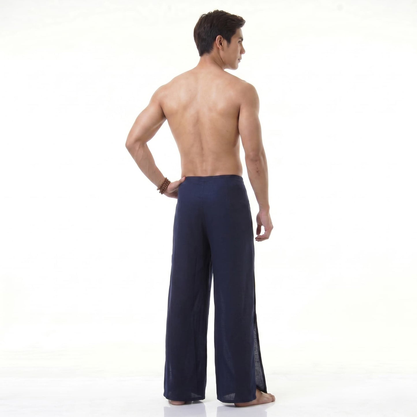 Back view of the blue Men's Thai wrap pants, ensuring cool comfort for active days.