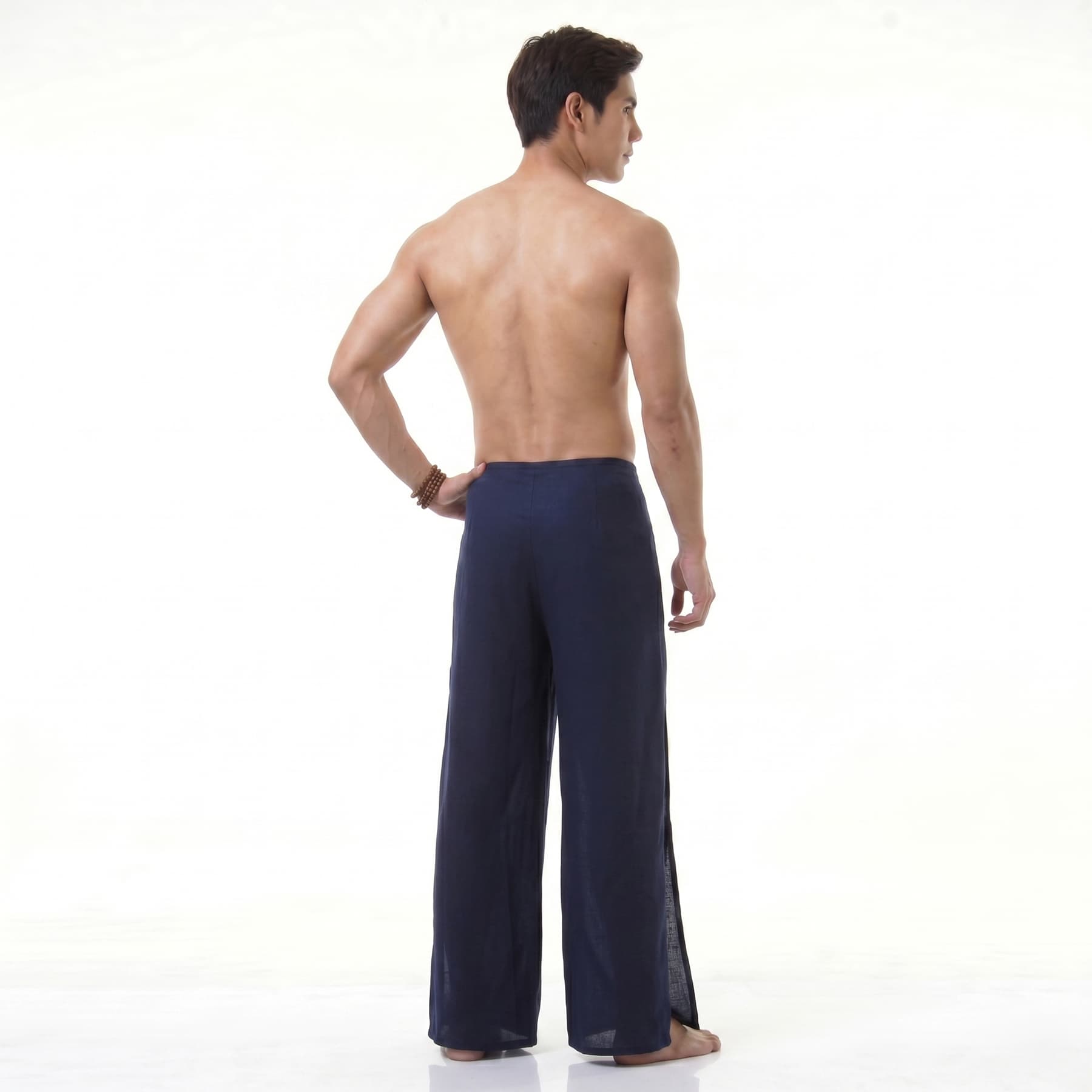 Back view of the blue Men's Thai wrap pants, ensuring cool comfort for active days.