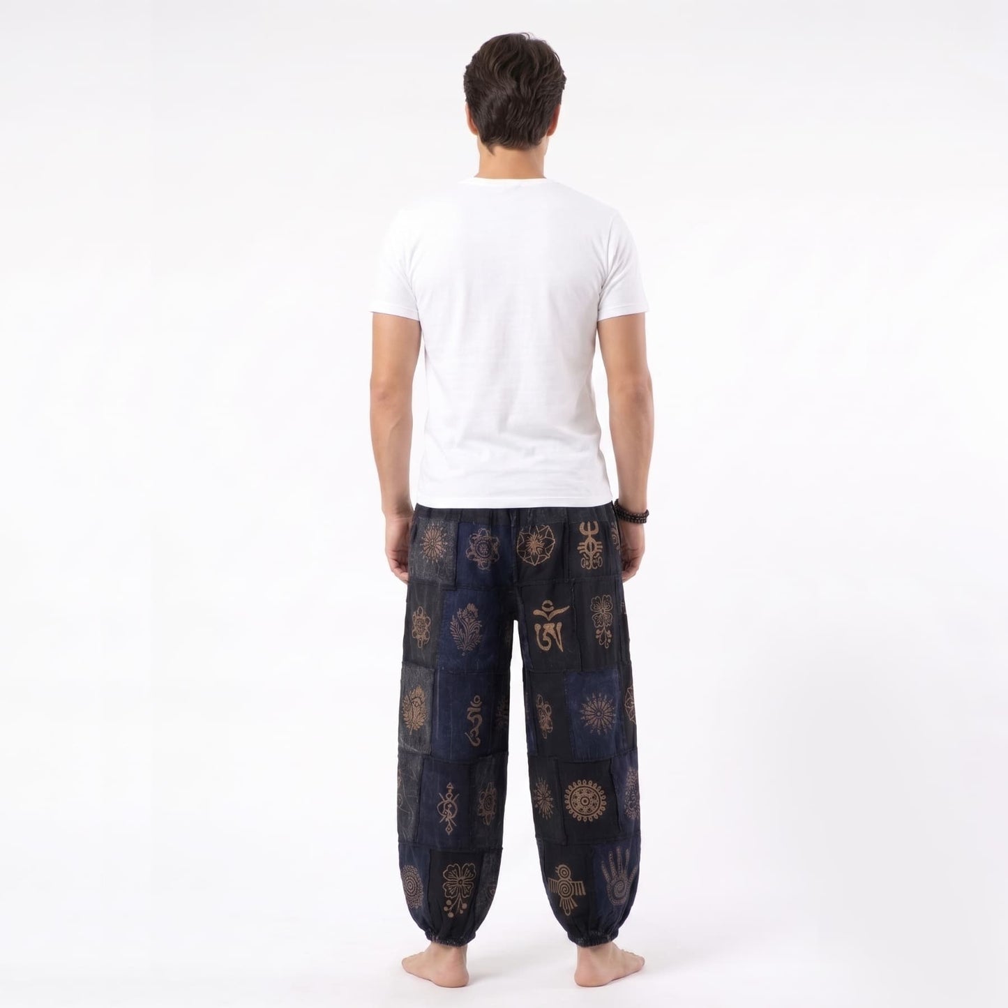 Back view of the black stonewashed organic cotton Men's harem pants, offering maximum breathability and relaxed style.