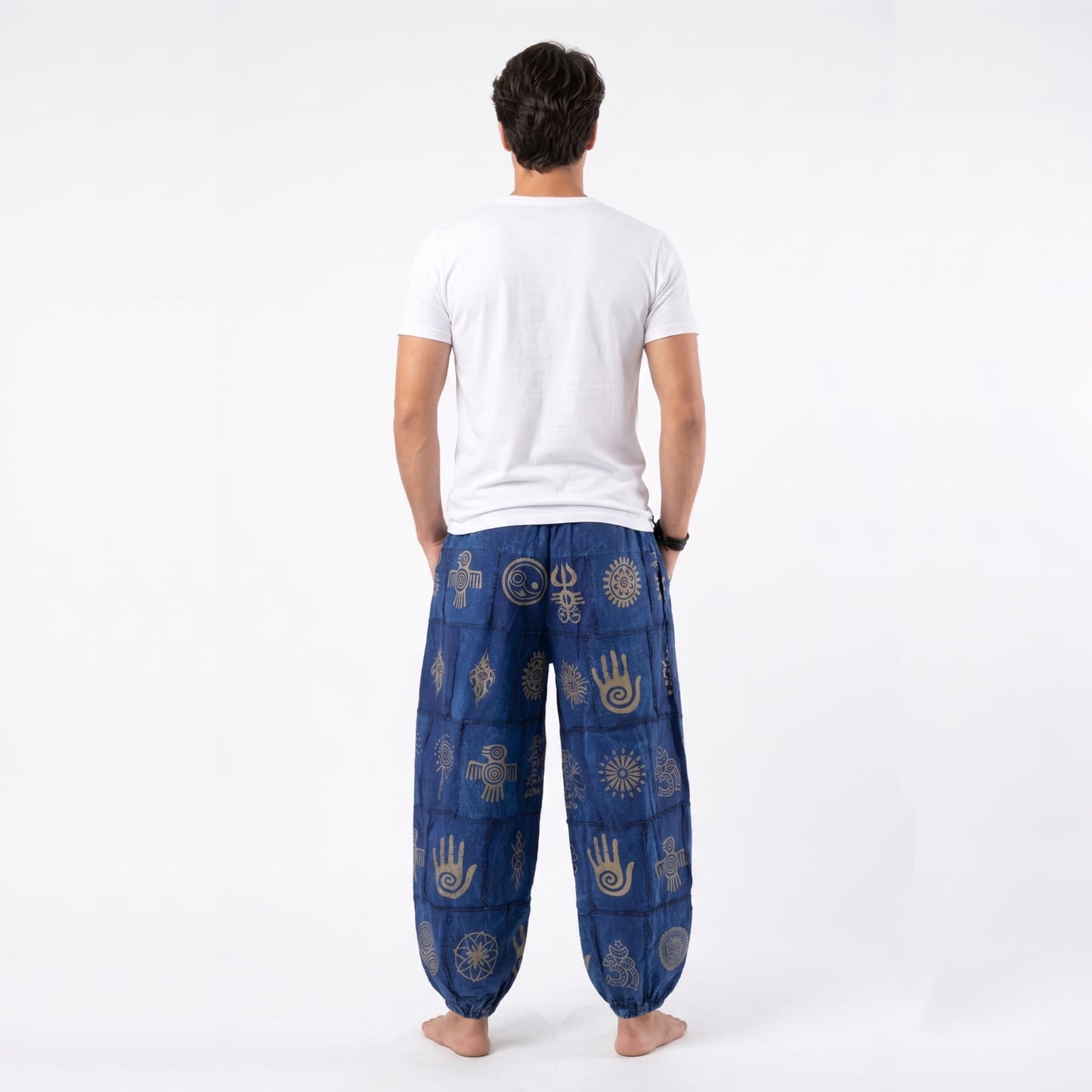 Rear view of the blue stonewashed organic cotton harem pants for men, demonstrating the lightweight and breathable design.