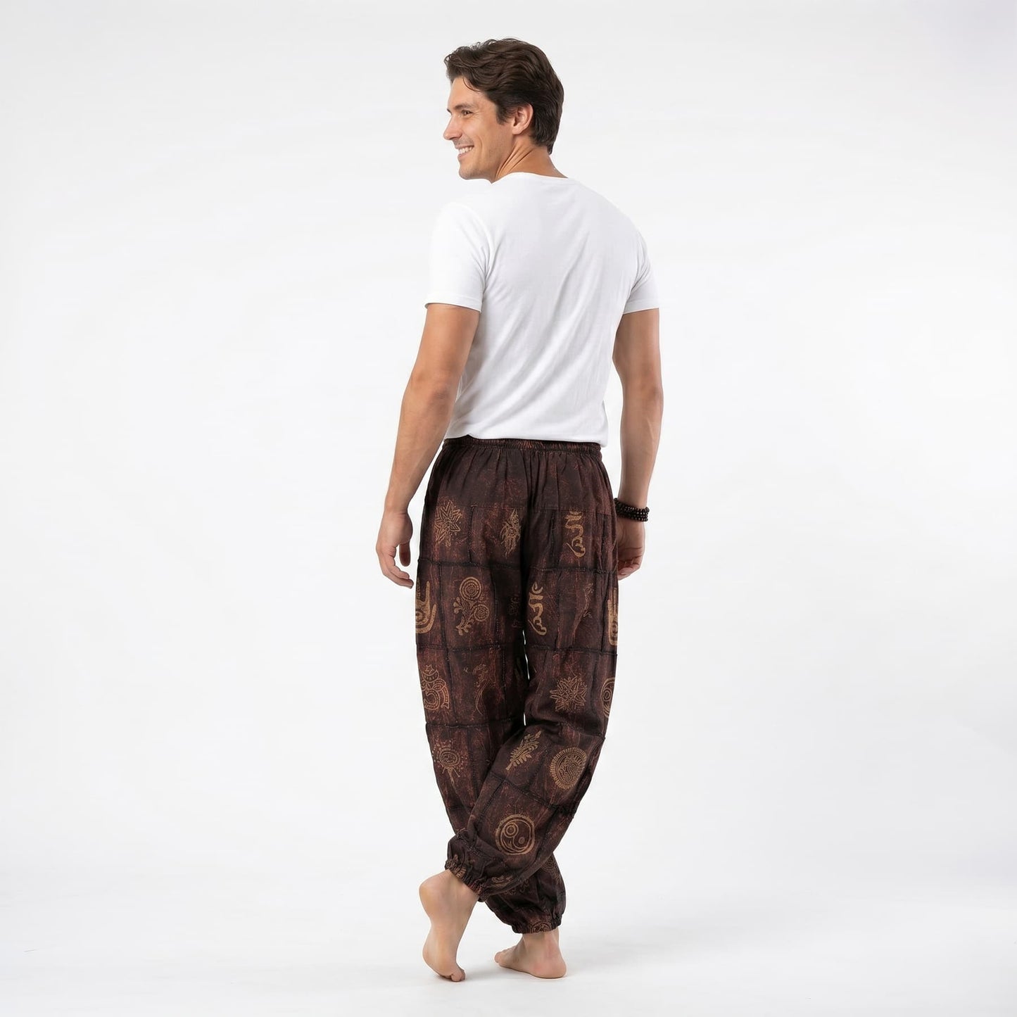 Rear view of the brown stonewashed organic cotton Men's harem pants, showcasing the durable yet soft construction.