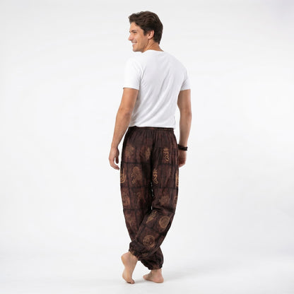 Rear view of the brown stonewashed organic cotton Men's harem pants, showcasing the durable yet soft construction.