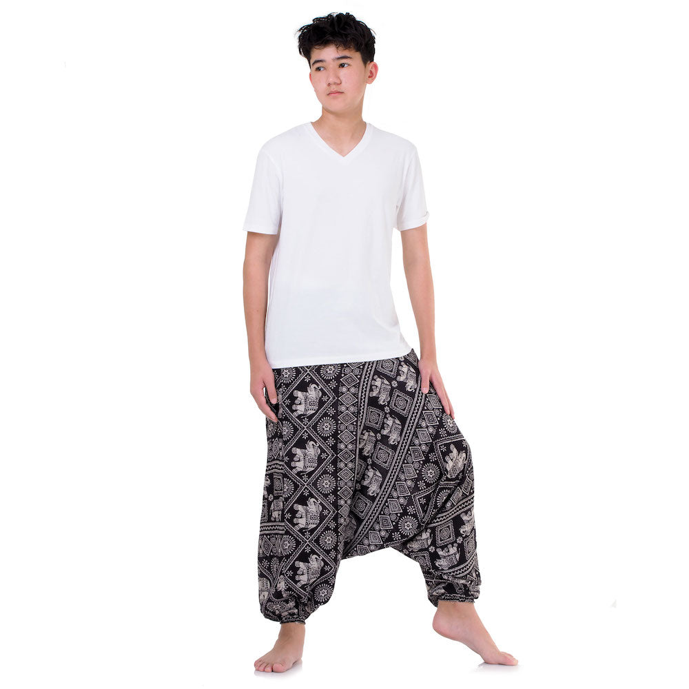 Side view of black elephant pants showing the relaxed ethnic drop crotch style.