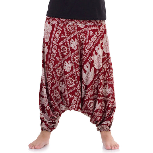 Detail of red drop crotch pants with handcrafted Thai Elephant patterns.