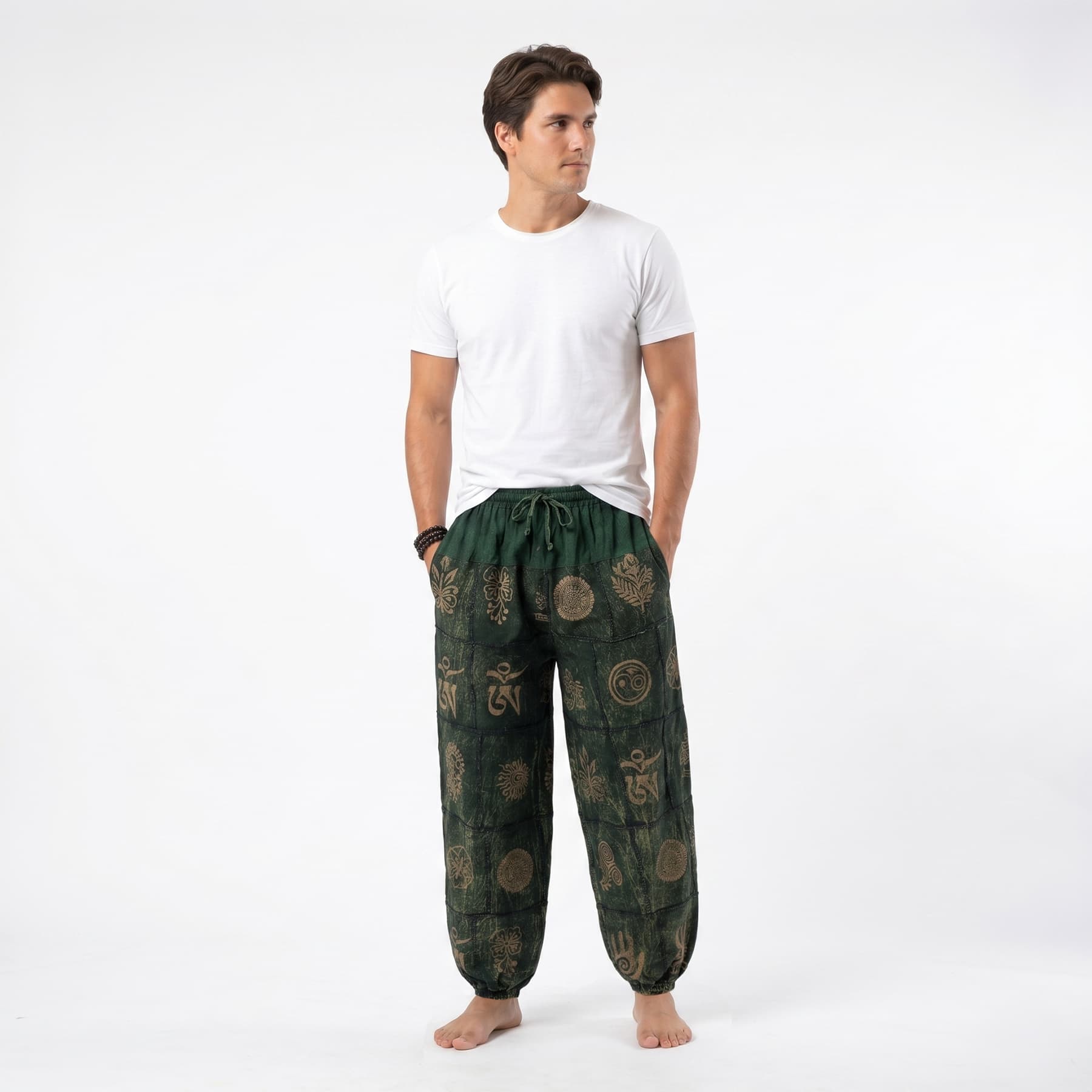 Front view of the Green Stonewashed Men's Tribal Harmony Harem Pants, offering a comfortable boho style for men.