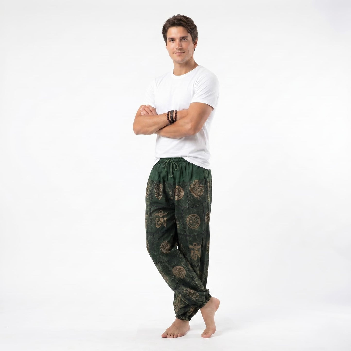 Side view of the green organic cotton harem pants for men, displaying the loose-fitting design and flexible waistband.