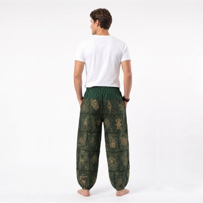 Back view of the green stonewashed organic cotton Men's harem pants, emphasizing the airy cut for warm days.