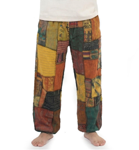 Close-up of a orange men Thai patchwork harem yoga pants
