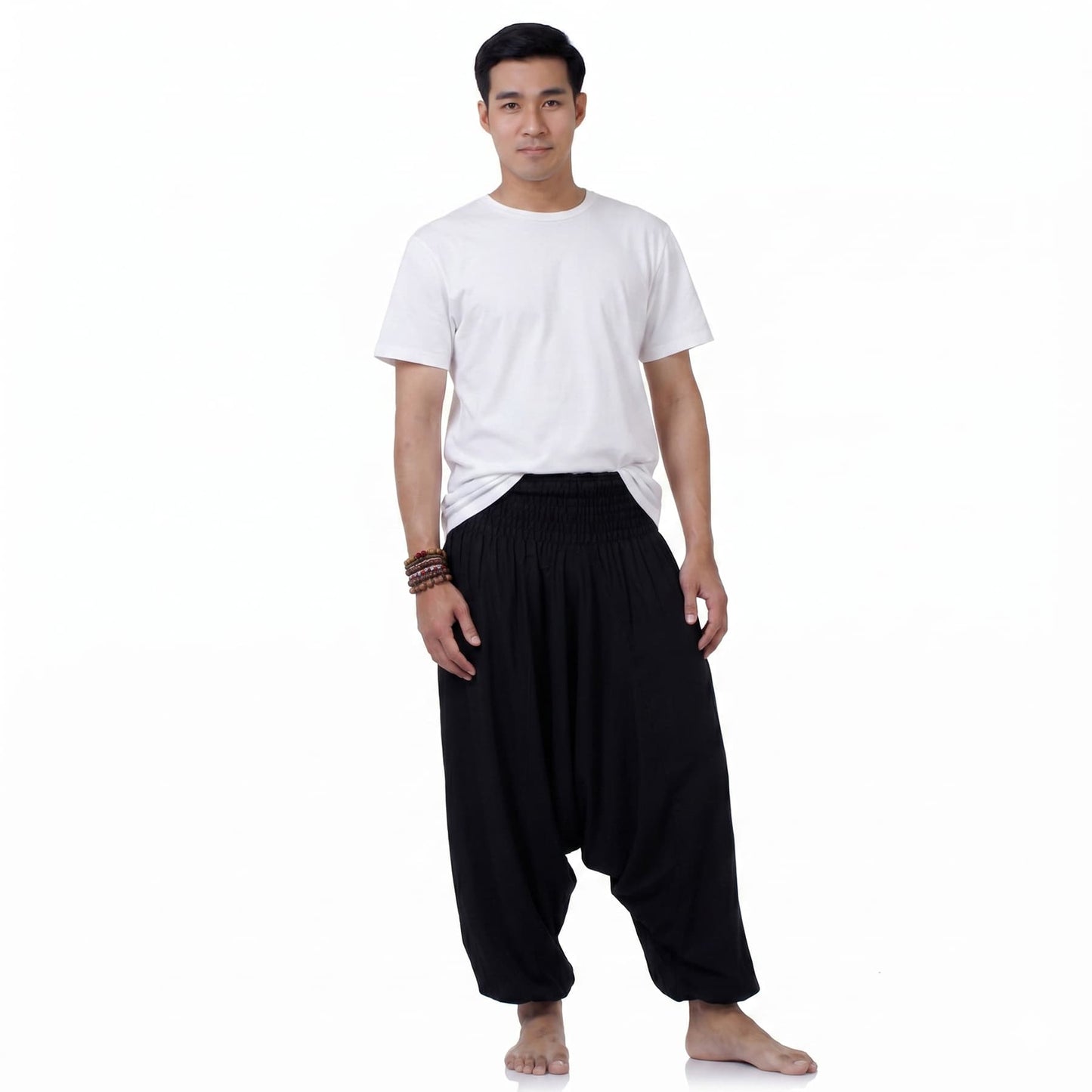 Front view of the Men's Midnight Black Drop Crotch Harem Pants, a timeless wardrobe essential for men.