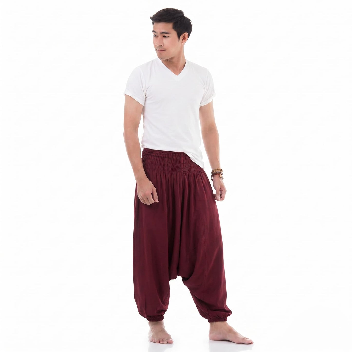 Side profile of the dark red low crotch pants for men, displaying the authentic bohemian silhouette.