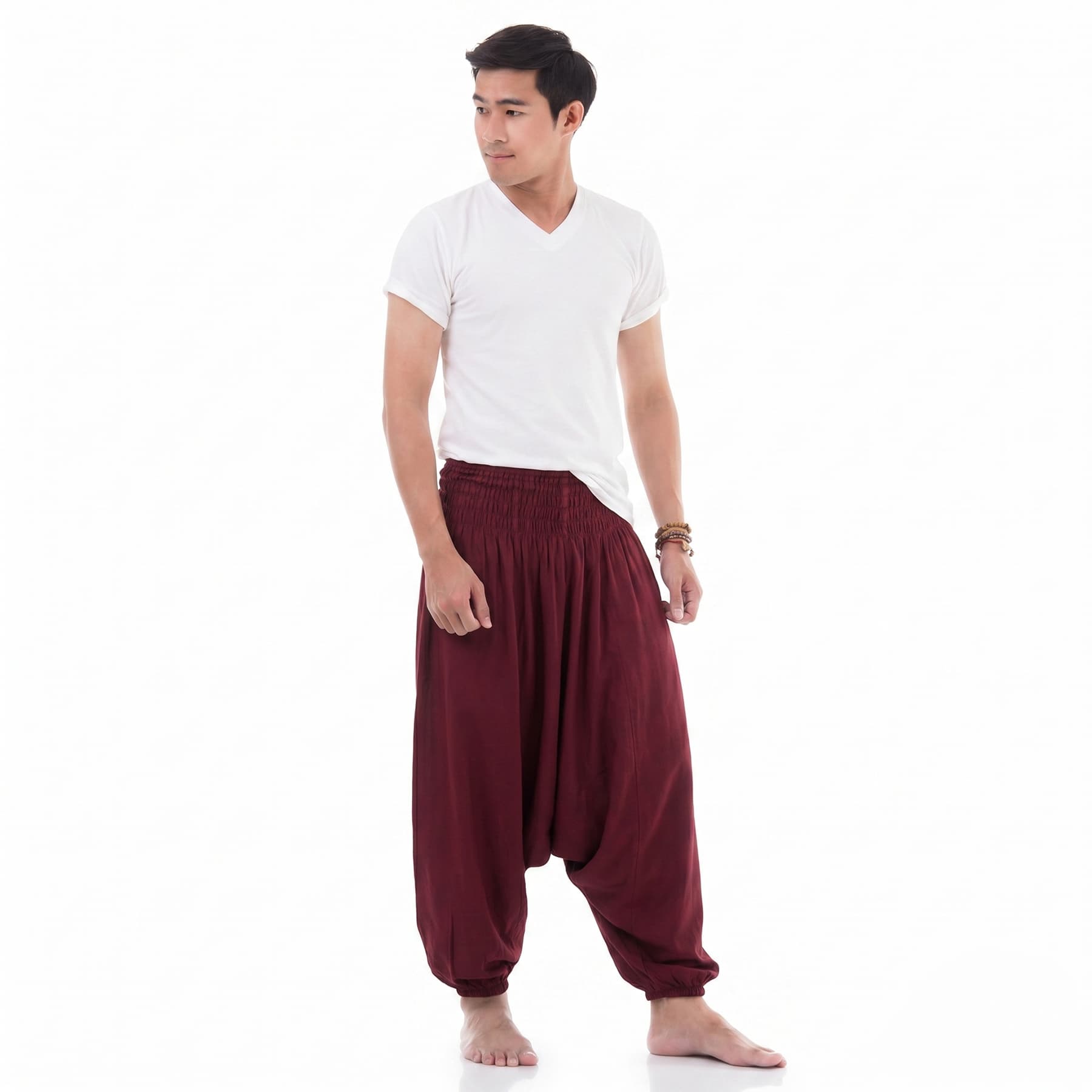 Side profile of the dark red low crotch pants for men, displaying the authentic bohemian silhouette.