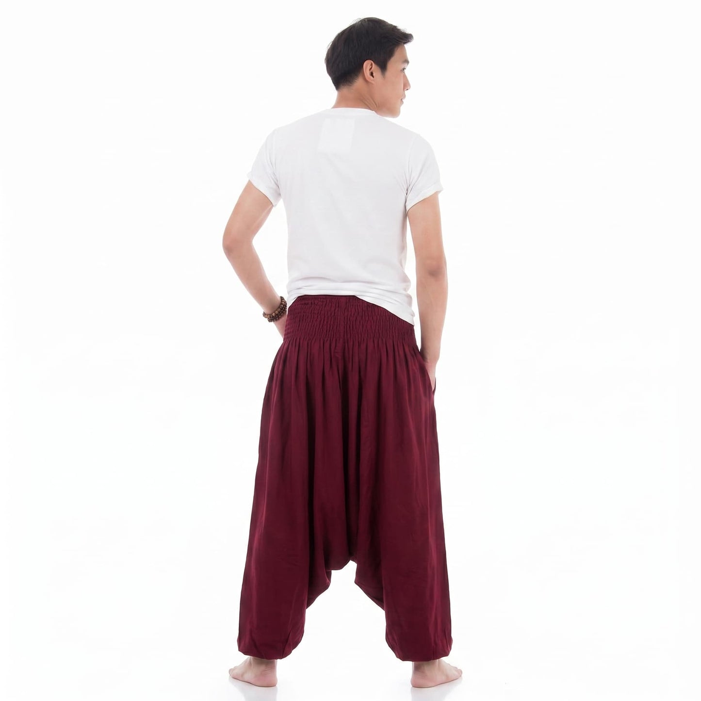 Rear view of the Mystic Maroon Men's drop crotch harem pants, showing the clean and airy design.