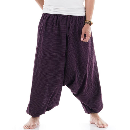 Close-up of a purple men pinstripe drop crotch Thai harem pants