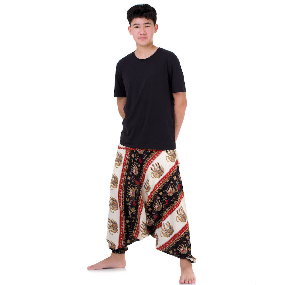 Male model wearing black boho drop crotch pants, handmade unique piece from Thailand