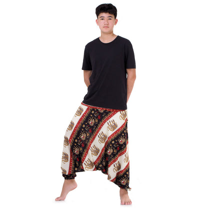 Side view of men's black elephant harem pants showing the relaxed drop crotch fit