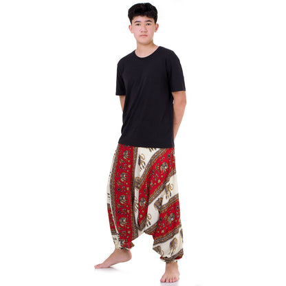 Side view of red elephant pants for men highlighting the airy drop crotch silhouette.