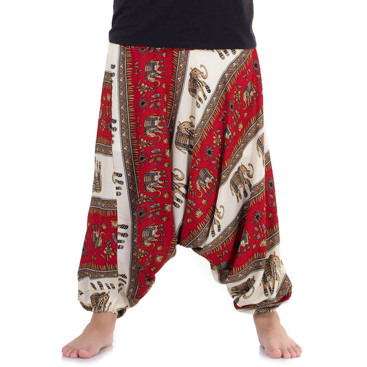 Detail of red drop crotch harem pants with traditional Royal Thai Elephant design.