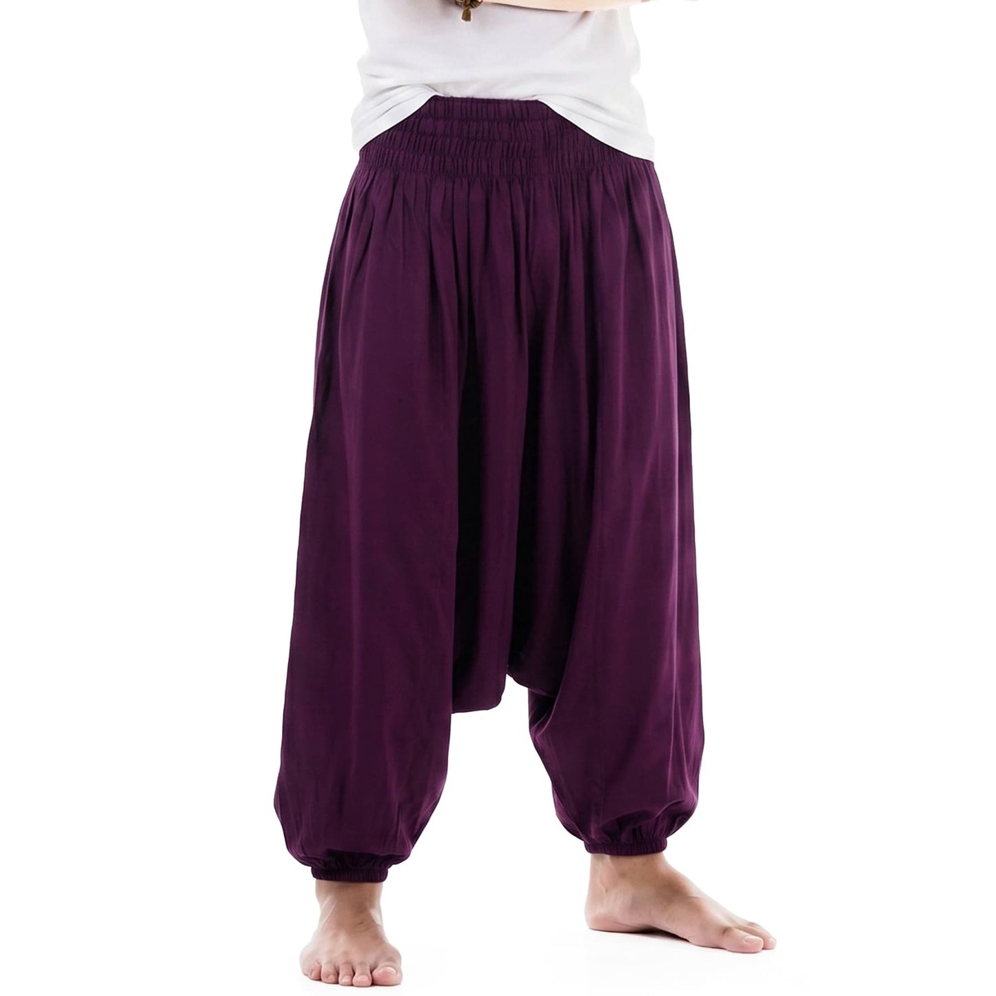 Detailed macro view of the purple Men's drop crotch harem pants, featuring vibrant and rich bamboo rayon tones.