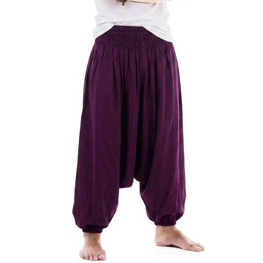 Detailed macro view of the purple Men's drop crotch harem pants, featuring vibrant and rich bamboo rayon tones.