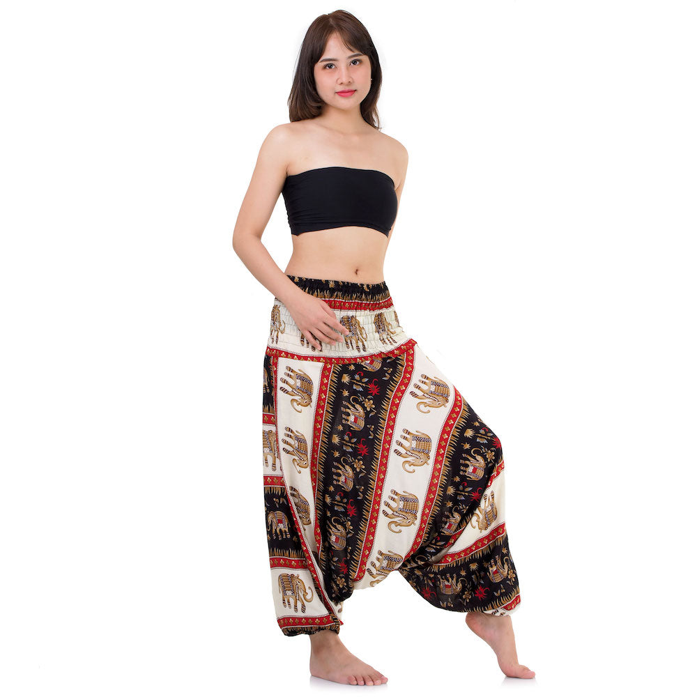 Side view of black 2-in-1 jumpsuit showing the airy fit and elastic waistband.