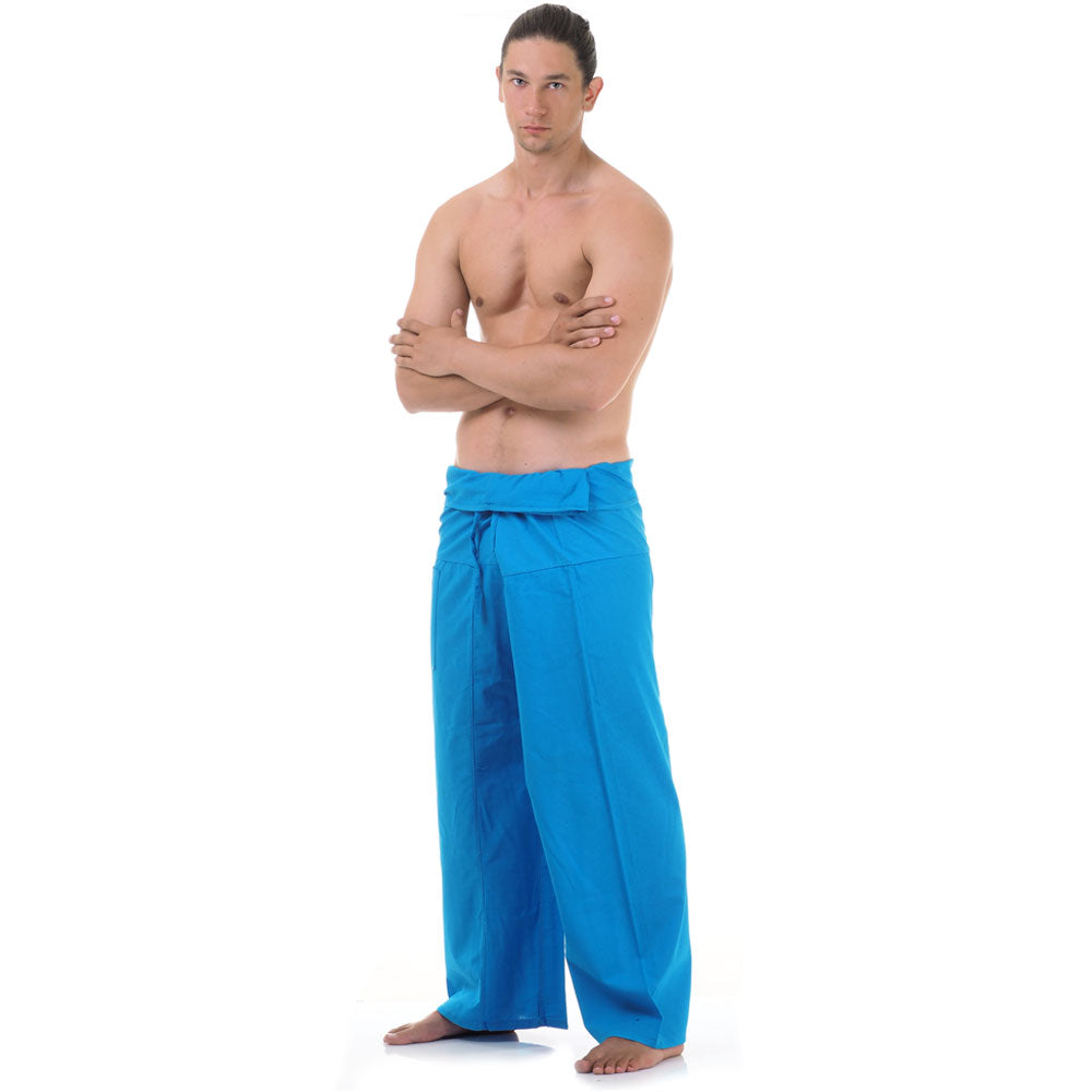 Side profile of a male model showing the relaxed fit and adjustable waistband of Sky Blue Horizon Thai fisherman pants.
